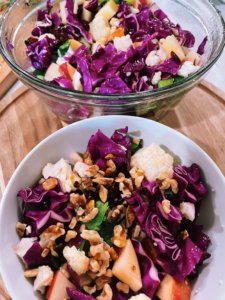 Apple, Cabbage, and Cauliflower Crunch salad on a table display