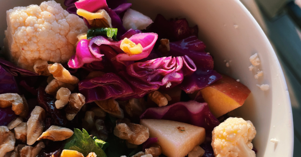 Apple, Cabbage, Cauliflower Crunch Salad in a bowl