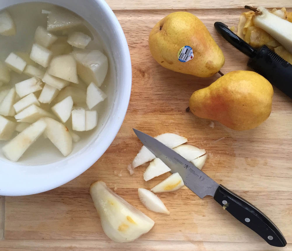 Pears being cut up for cooking