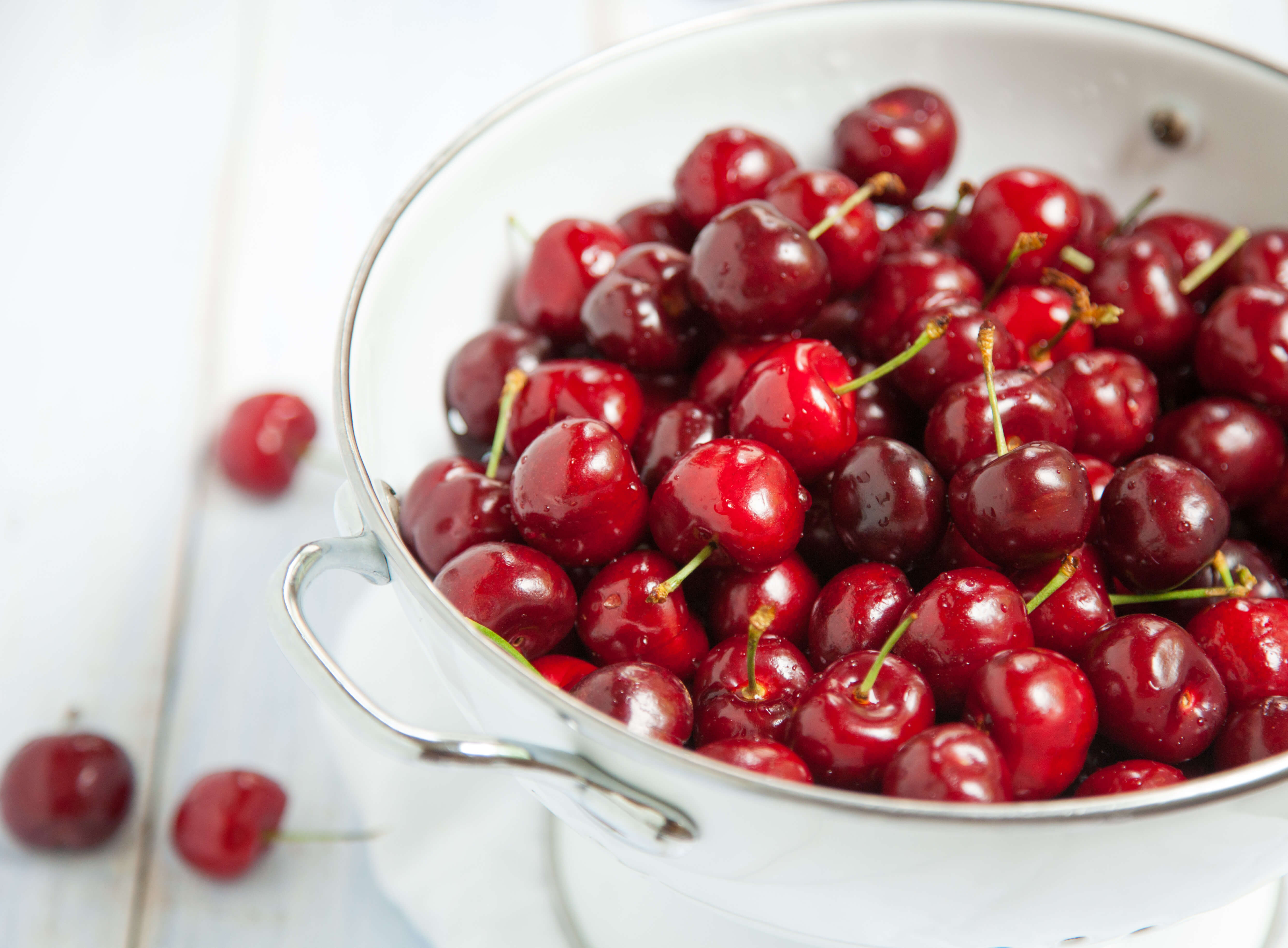 Dark Sweet Cherries in Colander Dark Sweet Cherries in Colander