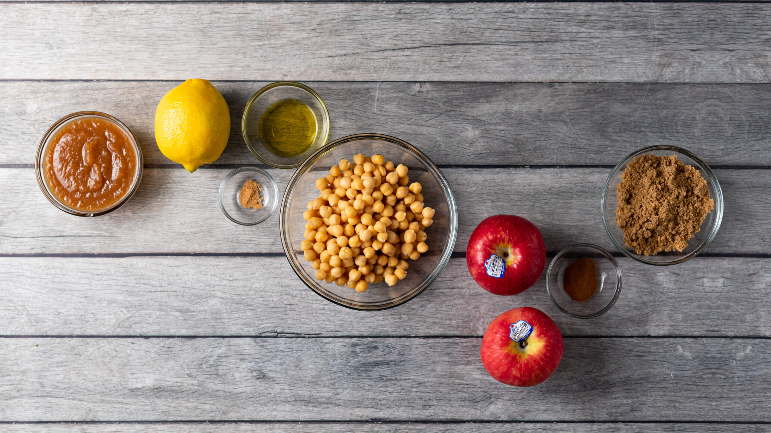 Ingredients for apple butter hummus displayed on a countertop.