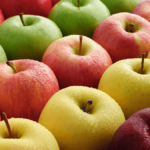 Multicolored apples in a row