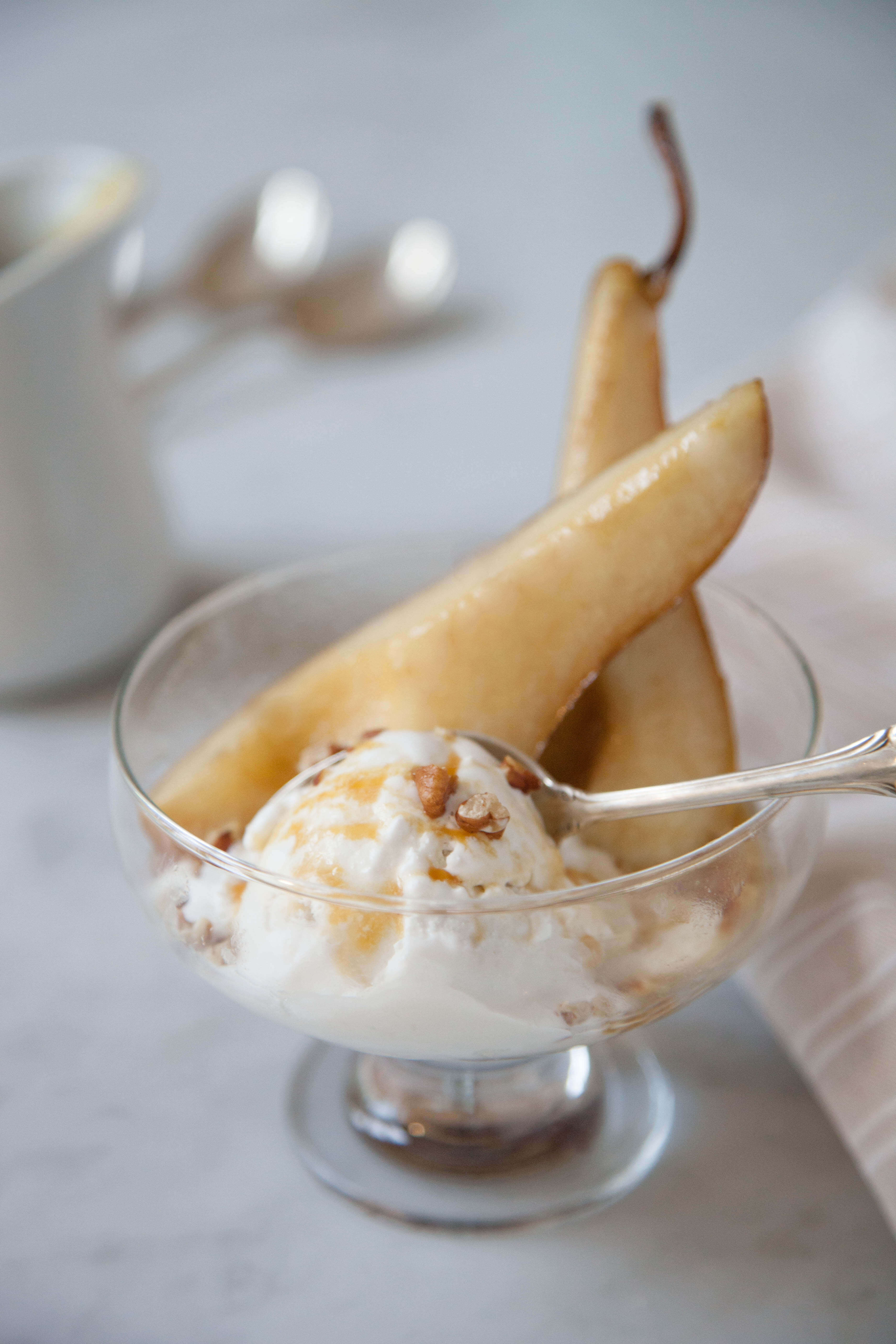 Warm Amaretto Bosc Pears & Ice Cream with Sea Salt Caramel and Toasted Pecans