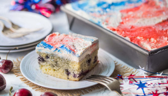 Sweet Cherry Vanilla Cake with Red, White, and Blue Swirl Frosting