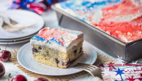 Sweet Cherry Vanilla Cake with Red, White, and Blue Swirl Frosting