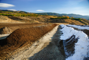 Our compost fields in the early spring, some with snow still on them