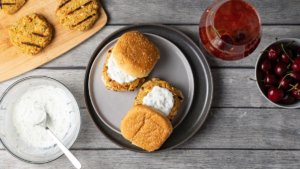 chickpea burger with yogurt sauce next to the plate