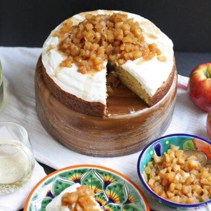 Buttermilk cake with Brie whipped frosting topped with spiced apples and caramelized apples.