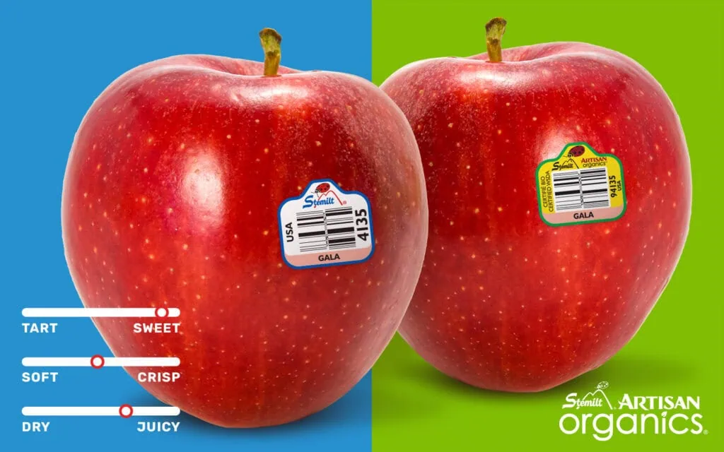 Fresh Gala apples with stickers, vibrant red color, and smooth skin.
