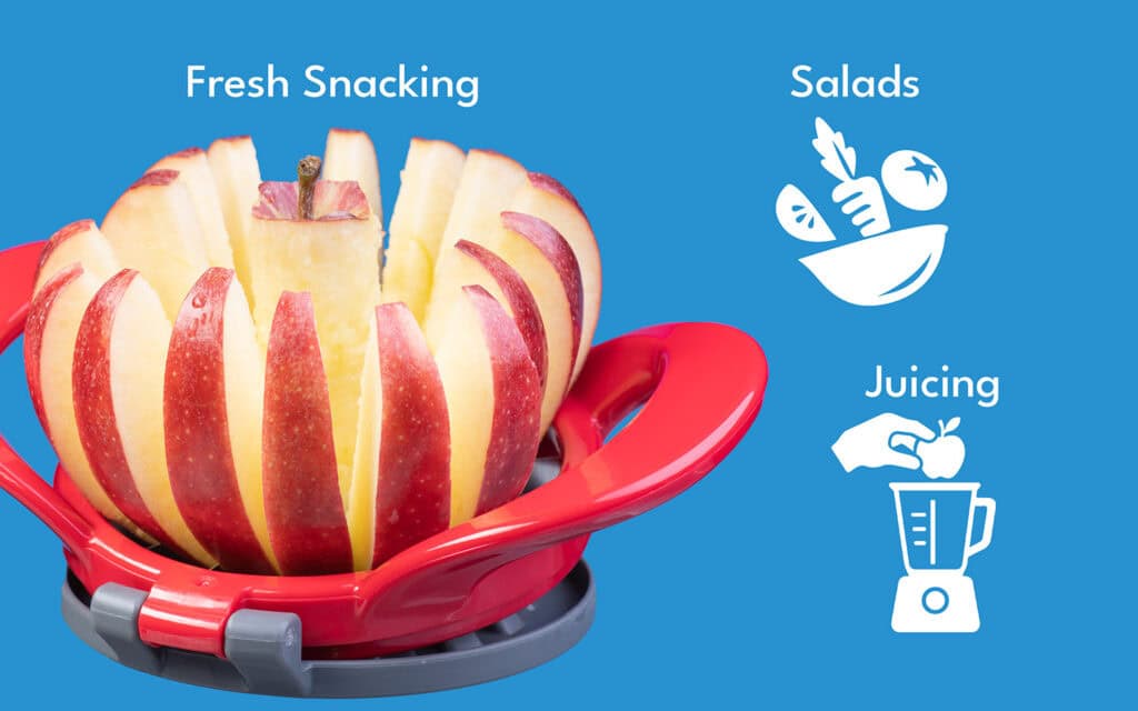 Sliced apple in a red slicer for fresh snacking, salads, and juicing.